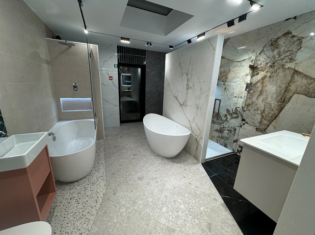 Marble bathroom, with white bathtub and shower room